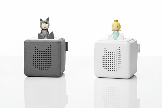 Toniebox Starter Set – Audio System for Kids | Screen-Free Storytelling & MusicKids WellnessToniesWellness Path HoldingTonies in two colors grey and white with mirror reflection – screen-free audio storytelling system for kids